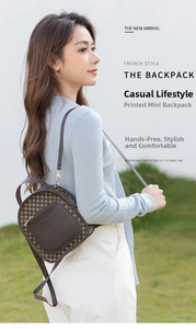 Detail of a brown printed mini backpack with geometric pattern on a female model outdoors