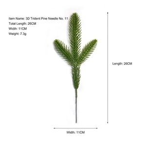 Detail view of artificial pine needles showing 26cm length and 11cm width specifications