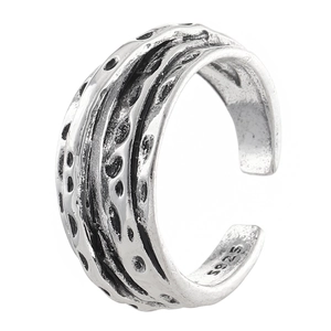 Macro shot of silver ring with vintage texture and S925 engraving on inner band