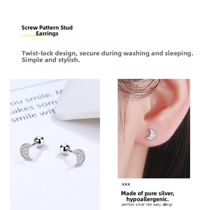 Macro shot of 925 sterling silver crescent moon stud earring with secure screw back closure