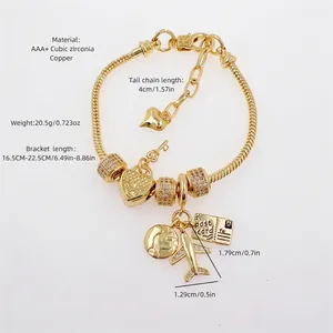 18K gold plated copper bracelet with zircon charms including heart, plane and globe