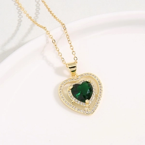 Elegant gold necklace featuring emerald green heart zircon with micro-pave diamond halo