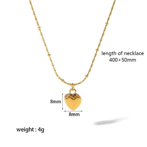 Detail view of 18K gold heart pendant necklace with dimensions 8x8mm and 400+50mm chain