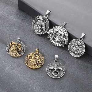 Detailed display of six Viking Norse mythology pendants with dragon and wolf motifs