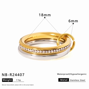 Detailed specs showing the 18mm diameter and 6mm width of these gold and silver stacked rings