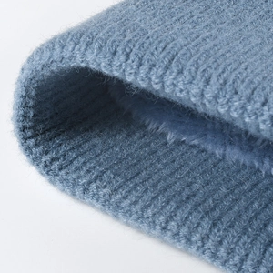 Winter chunky knit beanie for women with warm fleece lining and stylish pom-pom