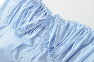 Detail of light blue French retro dress featuring ruched chest design and tie-up drawstring