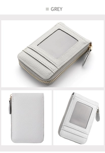 Detailed view of grey lychee textured card holder with zipper pocket and ID window