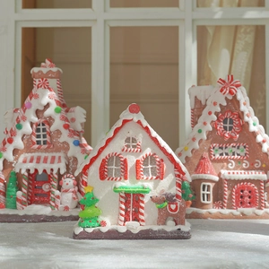 Light-up gingerbread candy house Christmas tabletop ornaments with snow textures