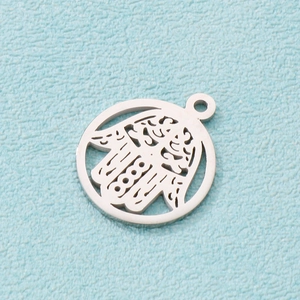 Round stainless steel Hamsa Hand hollow pendant charm with a polished metallic finish