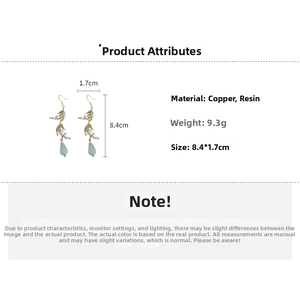 Detail of Lily of the Valley drop earrings showing dimensions 8.4x1.7cm and resin material