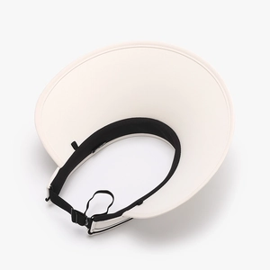 Women's wide brim UV protection sun visor in off-white with adjustable black strap