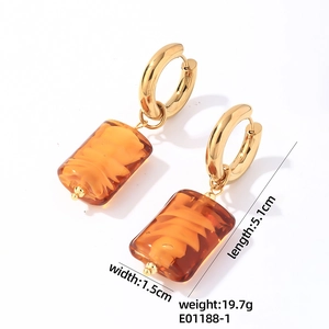Macro view of vintage amber resin earrings with stainless steel gold hoop dimensions