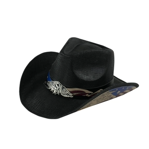 Detailed texture of black woven cowboy hat featuring a USA eagle wing metal emblem