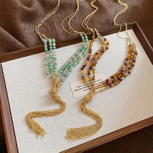 Ethnic style crystal beaded tassel necklace featuring multi-layer vintage long fringe design