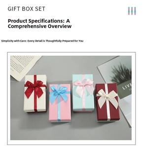Detail of rectangular gift boxes with bow ribbons and elegant woven texture finish