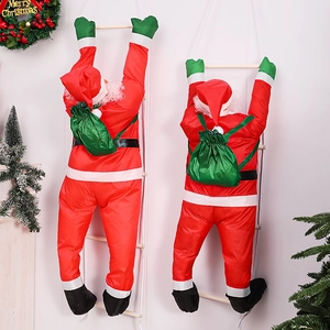 Detail showing two climbing Santas on a rope ladder with festive Christmas decorations