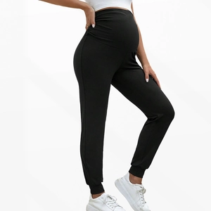 Detailed side view of black high-waist maternity joggers with supportive belly panel