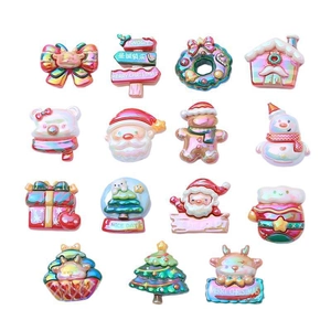 Assorted Christmas resin charms for DIY crafts featuring gingerbread man and snowman