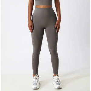 Detail view of high-waisted breathable yoga leggings with sleek side stitching