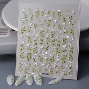 Detailed 5D relief nail stickers featuring white daisies and green leaves designs