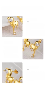 Detail view of 316L stainless steel heart earrings with cubic zirconia and snap closure
