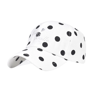White baseball cap with black polka dots and Ciao Belle embroidery on the front crown