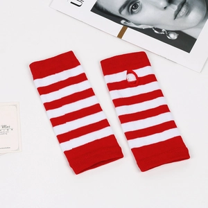 Macro detail of red and white striped knit arm sleeves with thumb hole and wide stripes