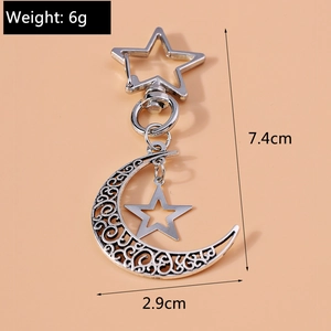 Detailed view of silver crescent moon and star keychain with precise size dimensions