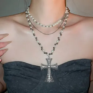 Elegant layered crystal cross pendant necklace with pearls and rhinestones for women