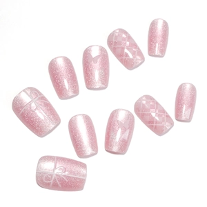 Pink cat-eye press-on nails set with bow-knot designs and elegant plaid patterns