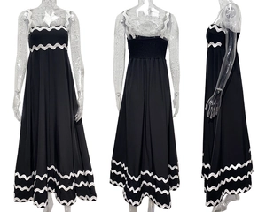 Three-view display of a black summer maxi dress with white wave trim and elastic back detail