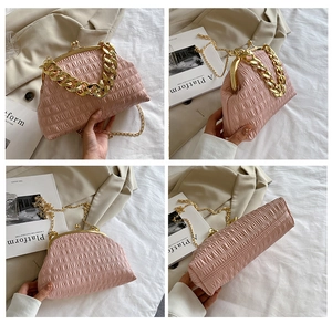 Detail shots of pink pleated shell bag with gold chain strap and kiss-lock closure