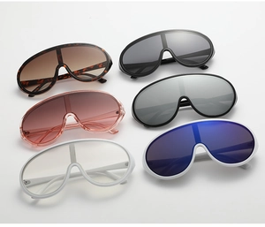 Detailed grid of oversized Y2K shield sunglasses in multiple fashion color variants
