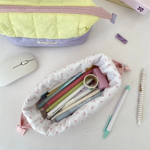 Quilted large capacity stationery bag with contrast color stitching and star pattern lining