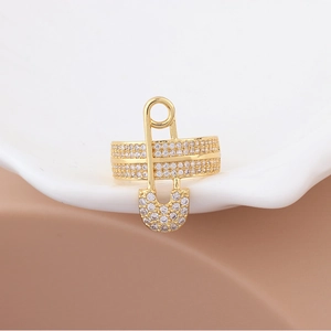 Safety pin design ring with micro-pave cubic zirconia in gold plated metal