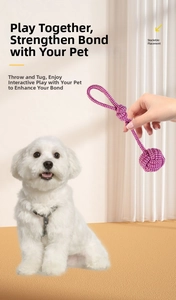 Detailed view of durable purple braided cotton rope dog toy for tug and pull interaction