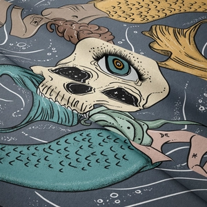 Macro shot of fabric texture and surrealist zodiac illustration on tapestry
