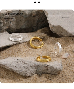 Detail view of geometric faceted S925 silver rings with matte and polished texture surfaces