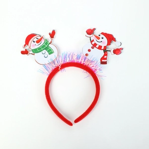 Christmas headband featuring plush red velvet and cute snowmen with festive tinsel