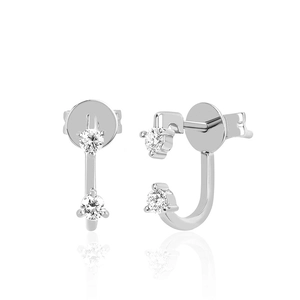 Detailed view of silver hoop earrings featuring two sparkling inset cubic zirconia stones