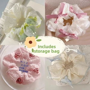 Detailed set of 4 ballet-style scrunchies with organza ribbons and rose decor
