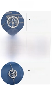 Macro details of polished S925 sterling silver tree of life jewelry set with zircon accents