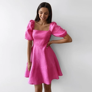 Detail of rose pink square neck dress with puff short sleeves and a slim waistline
