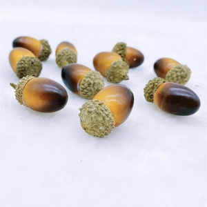 Realistic artificial acorns for Christmas home decoration and DIY photography props