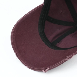 Deep burgundy distressed baseball cap for women with wide brim and vintage cotton fabric