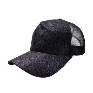 Detail view of black sequins glitter texture and breathable mesh on the ponytail baseball cap