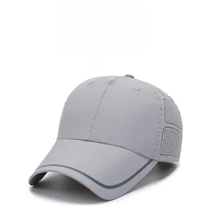 Detail of light grey quick-dry baseball cap featuring breathable mesh and curved brim line