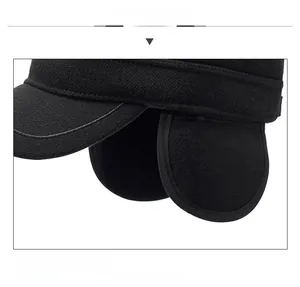 Detailed close-up of winter wool flat cap featuring integrated ear protection flaps