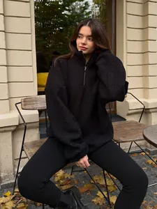 Women's black oversized teddy fleece sweater with half-zip and stand collar for autumn